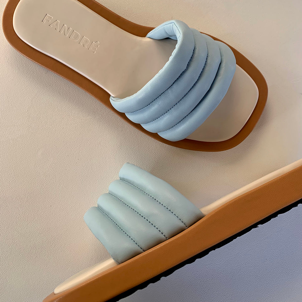 Blue flatform sandals for women detailed up and side view