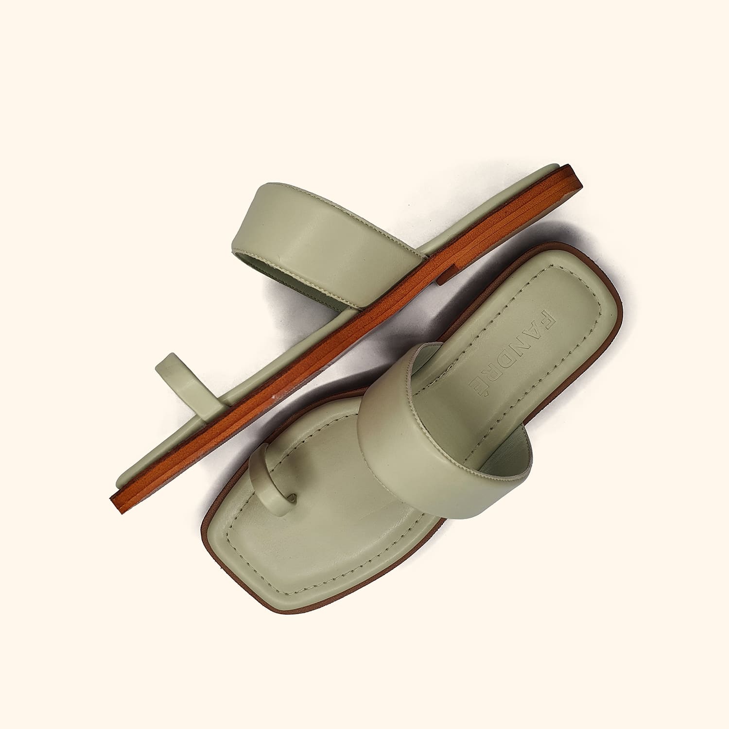 mint green women's flat sandals up and side view