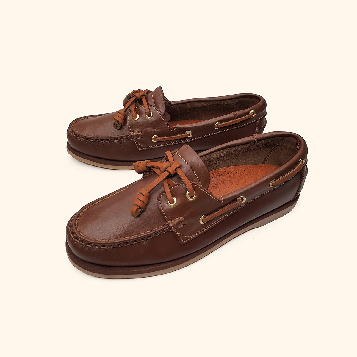 Women's brown leather boatshoes dual upside view