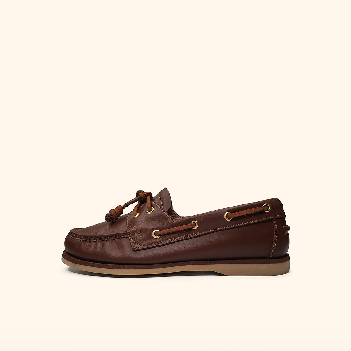 Women's brown leather boatshoes side view