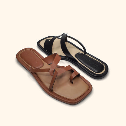 brown and black flat sandals for women upside view