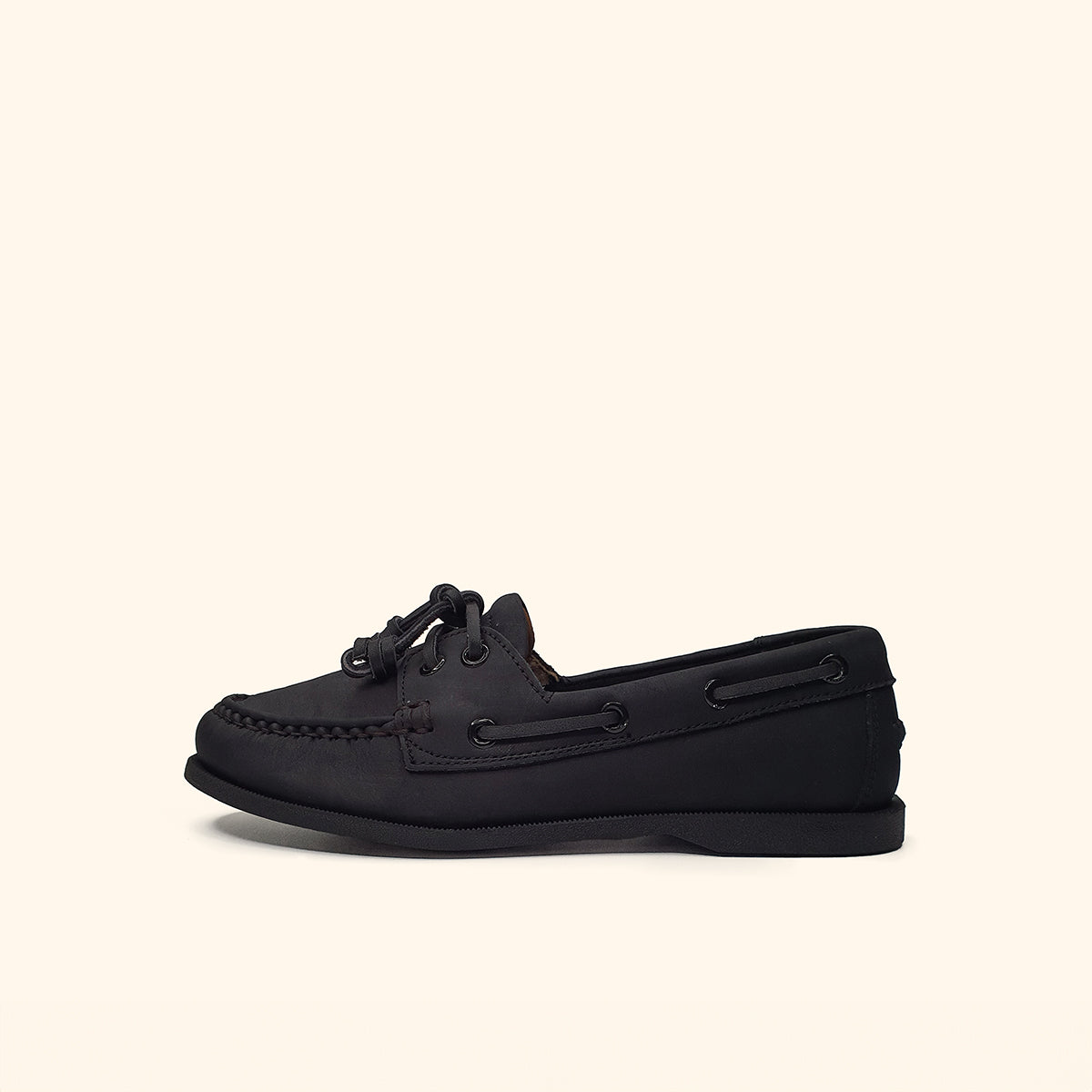 women's black leather boatshoes side view