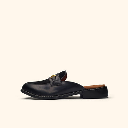 women's black suede mules side view